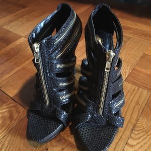 Embossed leather high heels with zipper detail