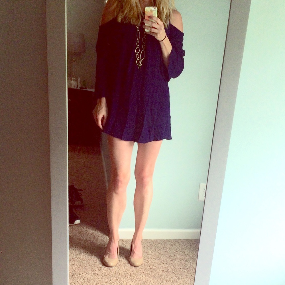 Beautiful navy dress. Size large. Runs small.