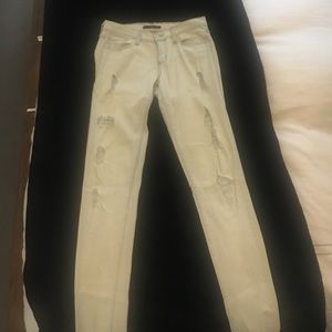 Light denim distressed jeans. Very soft!