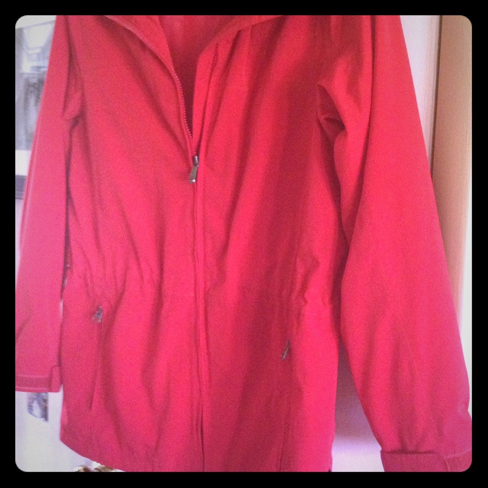 Red hooded rain jacket.         EUC