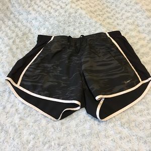 Black Nike running shorts