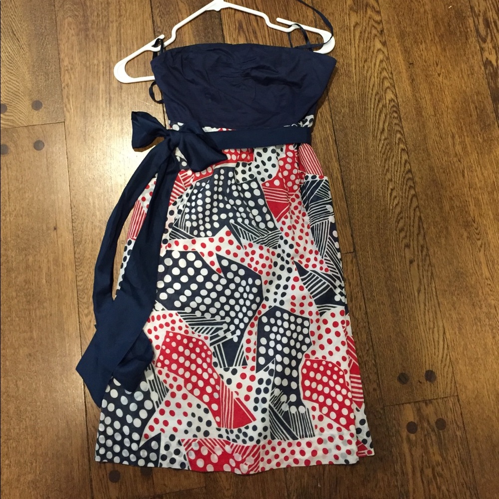 Strapless Anthropologie dress with pockets.