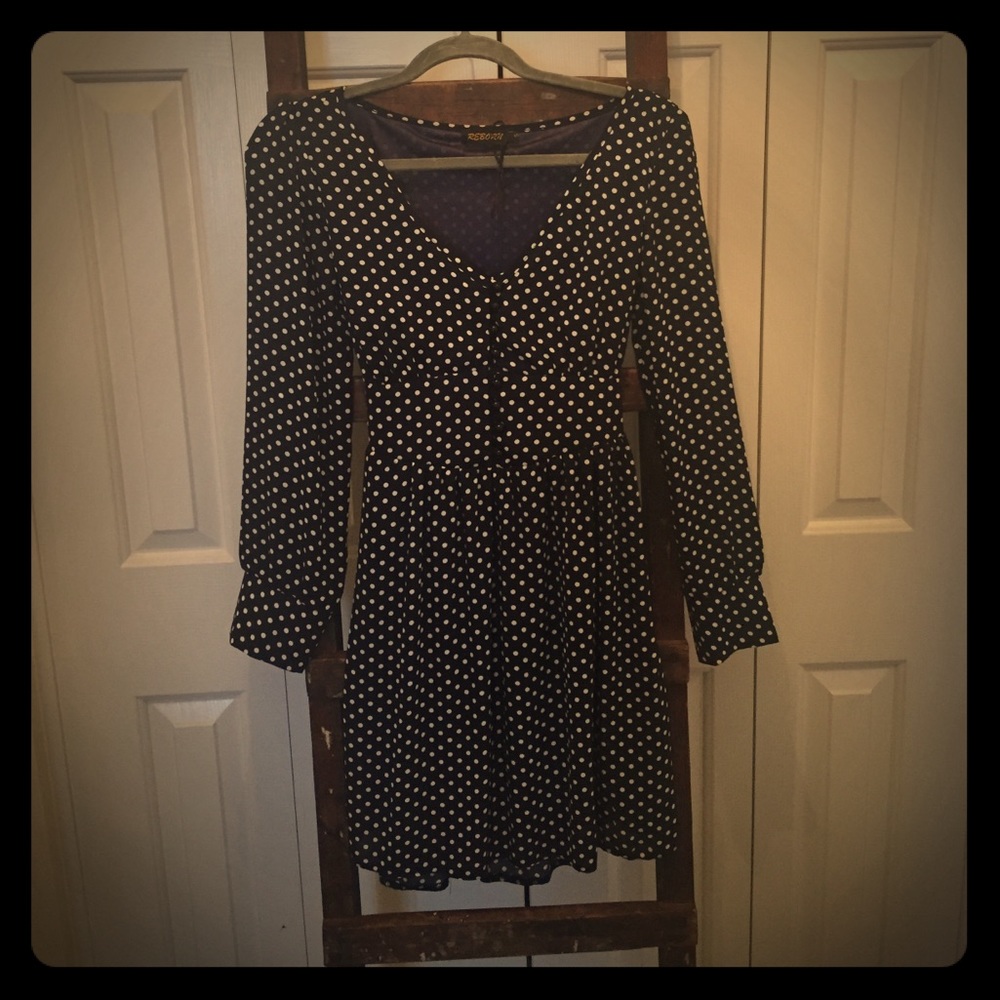Reborn (size S) navy polka dot dress.