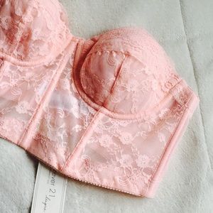 Coral pink corset bra.