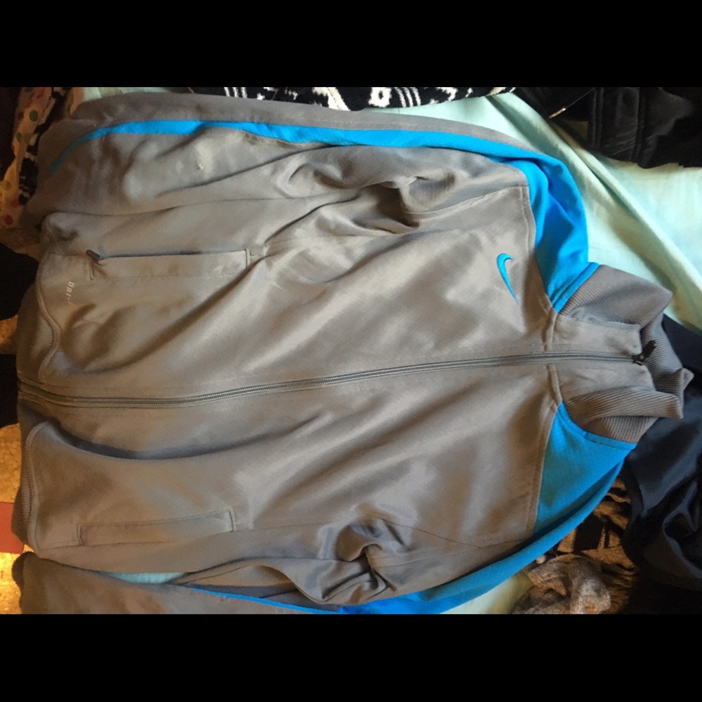 Gray and blue Nike sweater