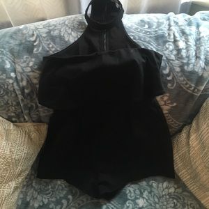 Romper, all black, style pictured on model