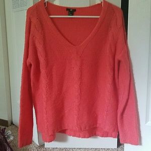Chunky cable-knit neon pink sweater