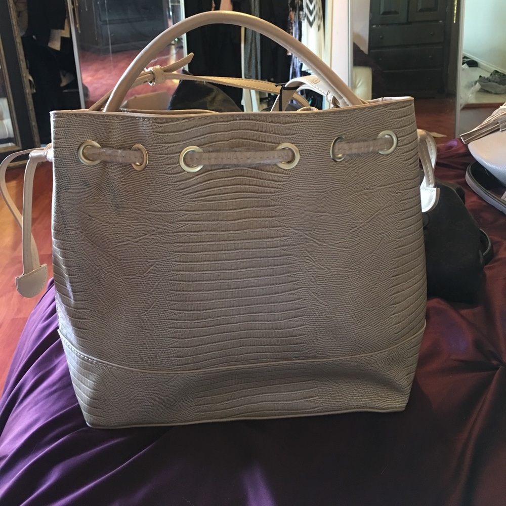 Creme alligator looking bucket bag