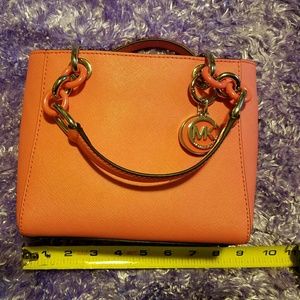 Michael Kors small handbag.