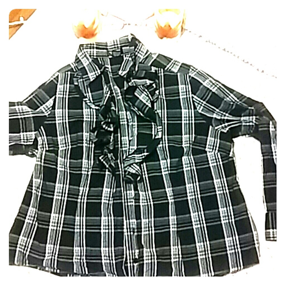 Black and white ruffled blouse
