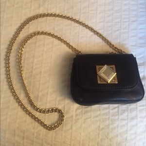 Michael Kors black and gold shoulder bag
