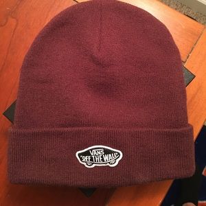 Vans maroon hat.