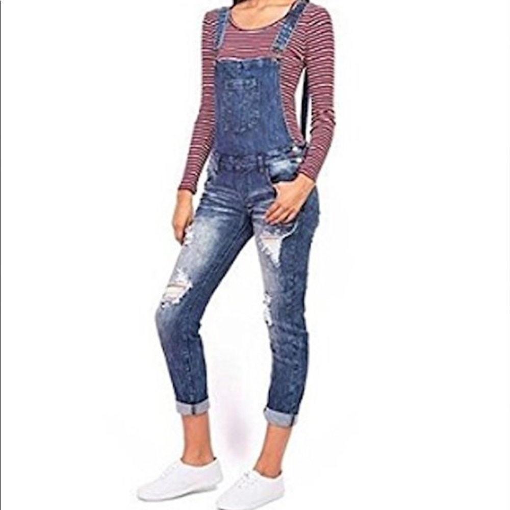 Machine distressed overalls