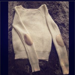 Sweater with  gold elbows  patches.