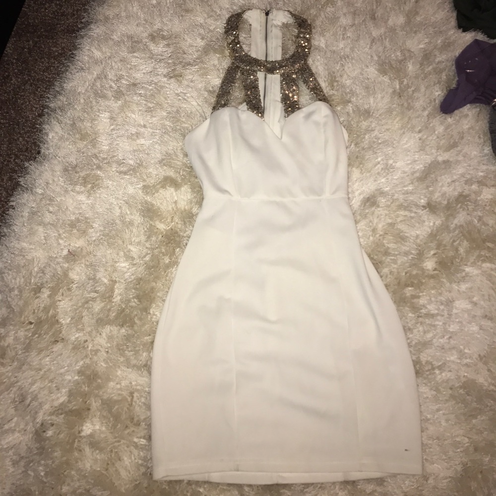 cream dress with gold sparkly neck