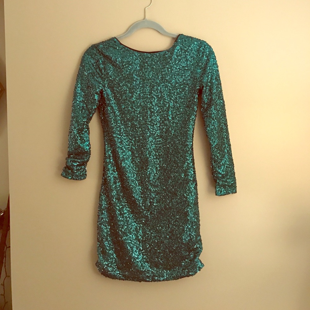 Beautiful green sequin 3/4 mini with scoop back