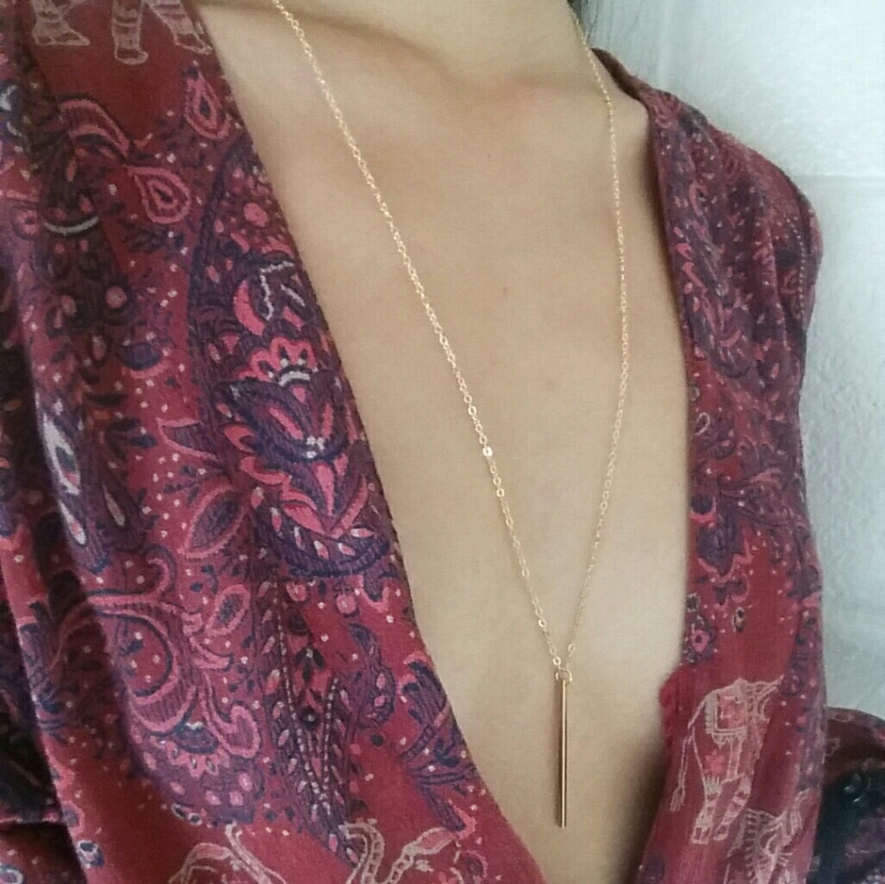 long gold necklace