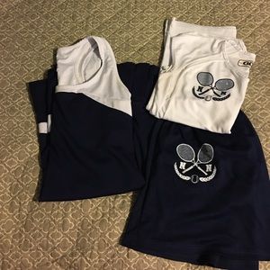 2 tennis outfits/uniforms.