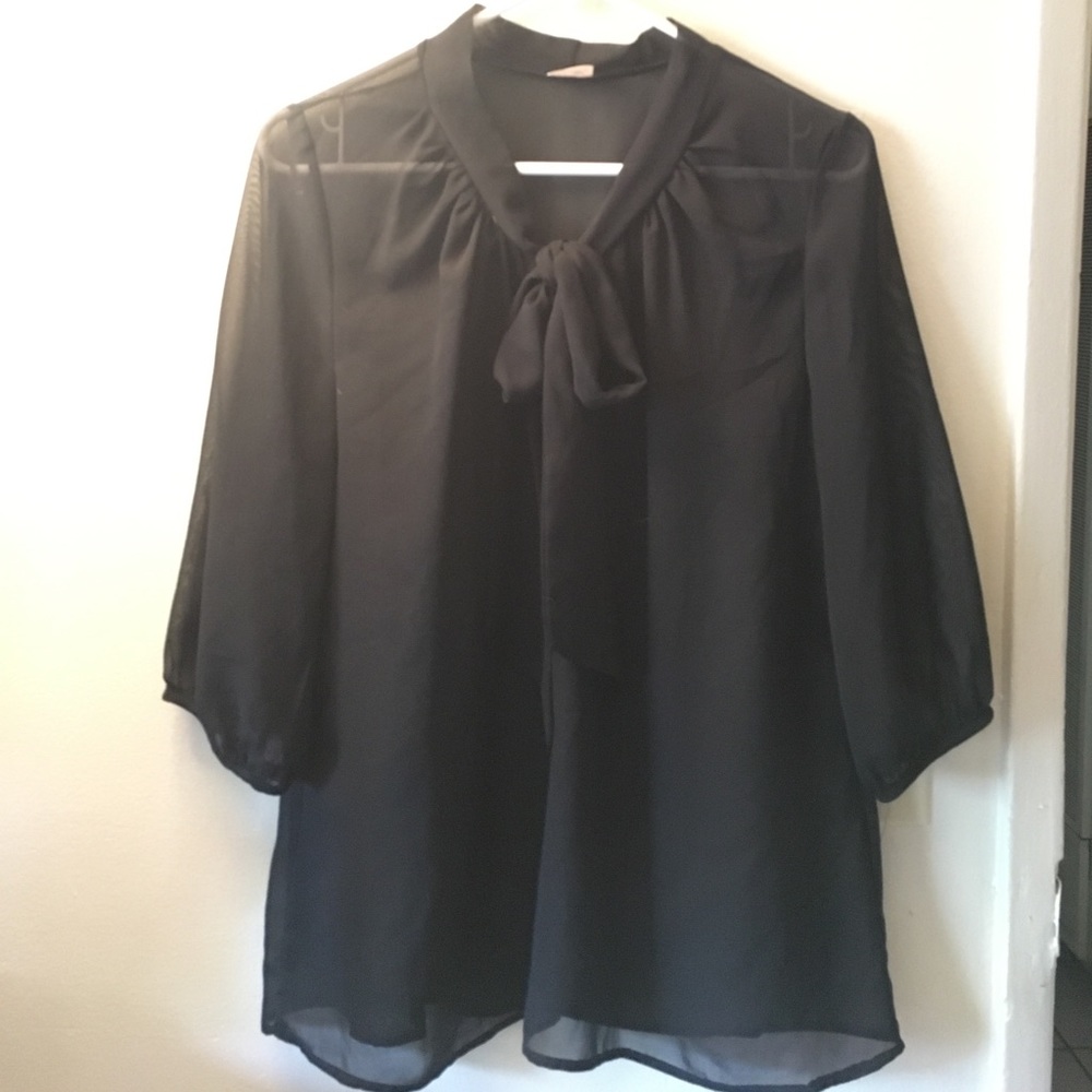 Sheer black blouse