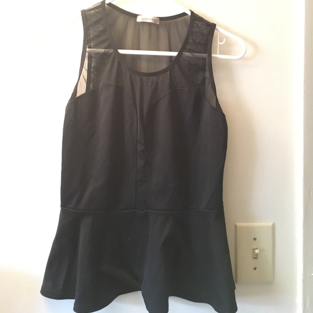 Peplum style top with sheer back
