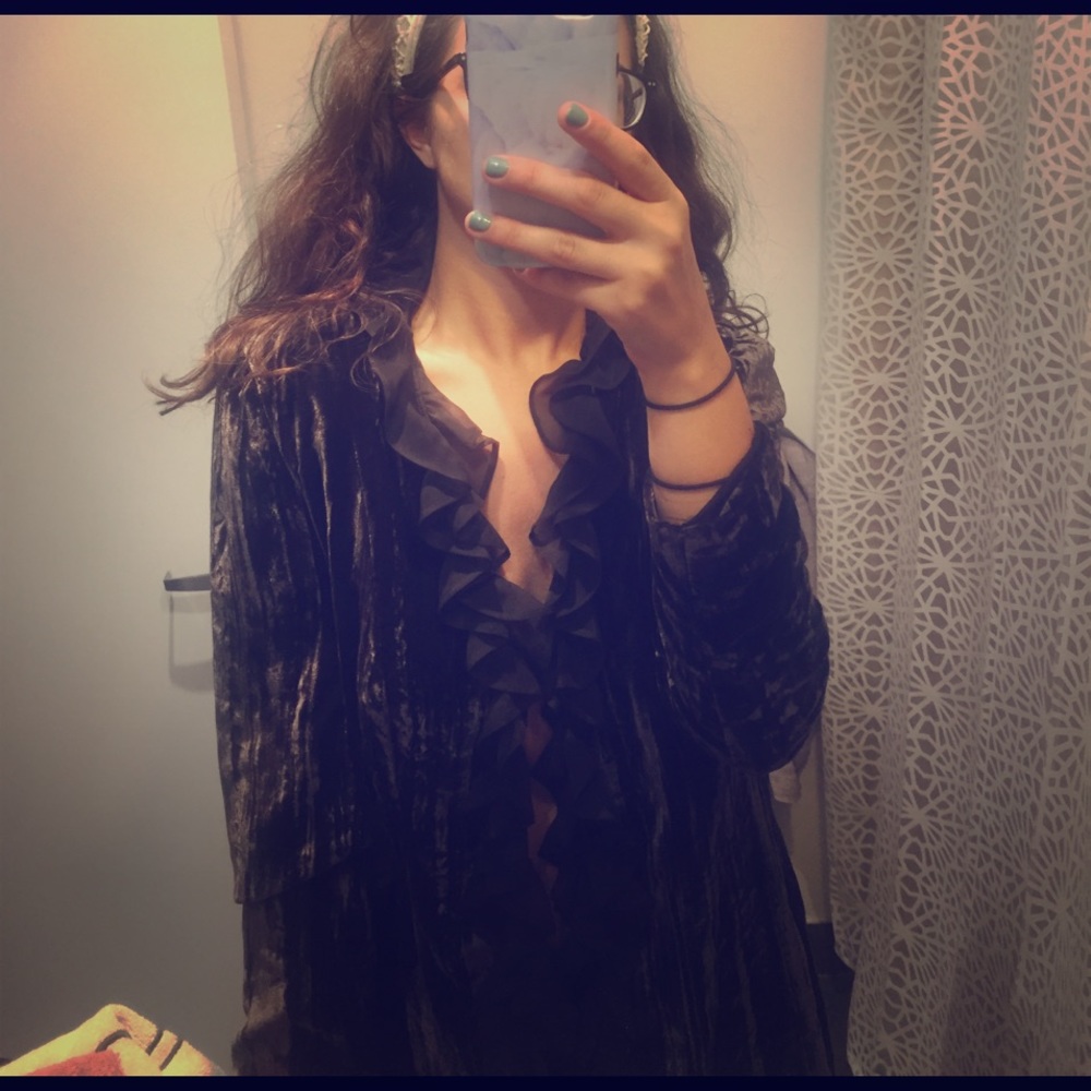 Velvet and ruffle jacket.