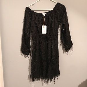 Black off the shoulder sequin dress