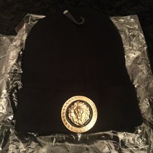 Black  Hat with lion embellishment