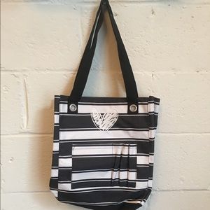 Brand new Thirty One tore bag