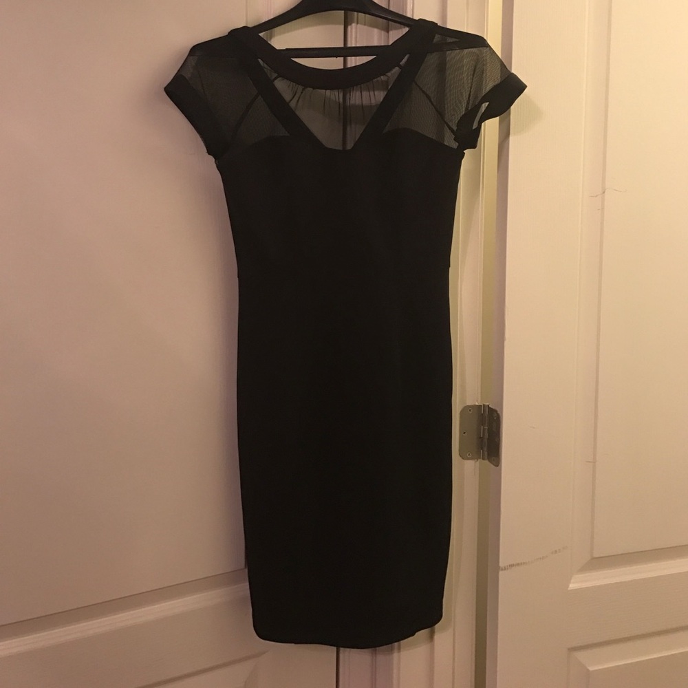 Little black dress with mesh neck