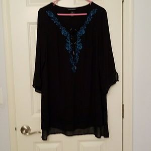Black blouse with teal embroidery