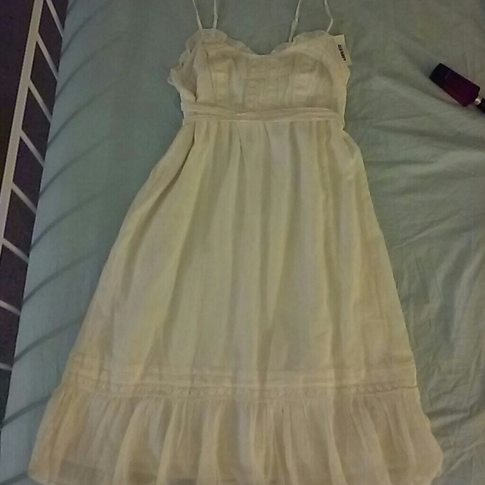 Cream ruffle bottom spaghetti strap dress long