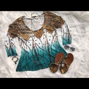 Colorful long sleeved knit top with animal print