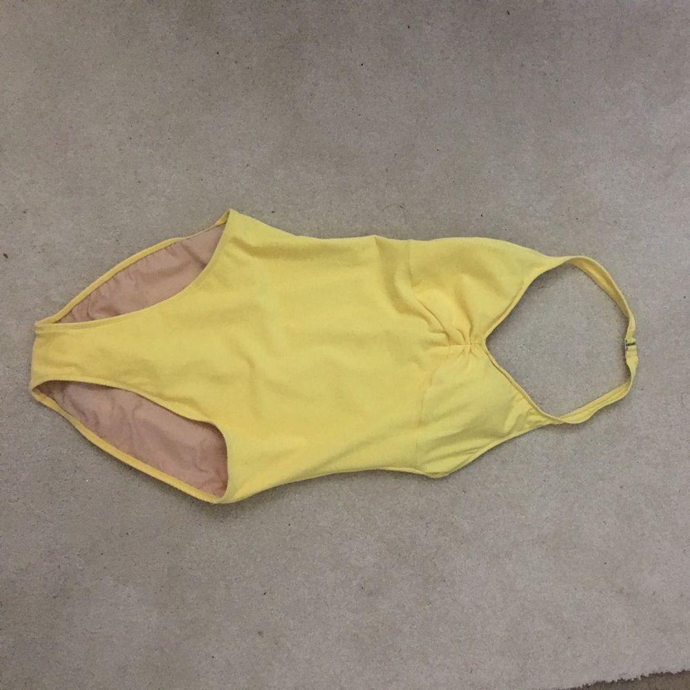 Sunshine yellow one piece suit. High cut size 12