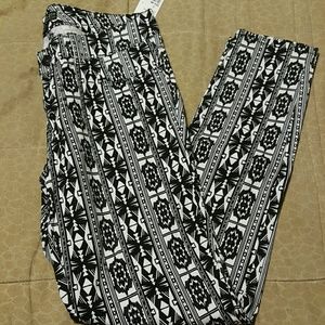 Brand new tribal print skinny leg jeans