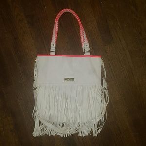 White Steve Madden crossbody bag.