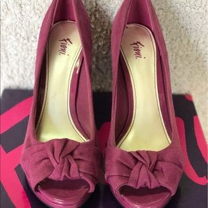 Fuschia peeptoe pumps