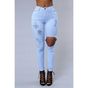 Fashion nova light blue distressed skinny jeans