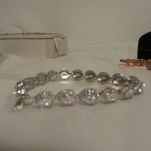 12 CTW GENUINE WHITE SAPPHIRE IN 14 KARAT WHITE GO