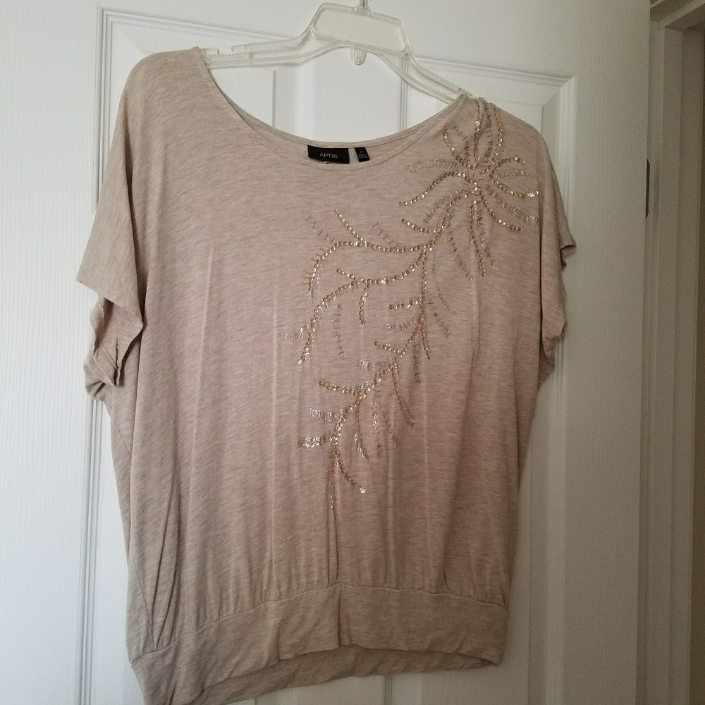Tan shirt with accent beading