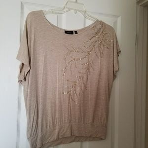 Tan shirt with accent beading