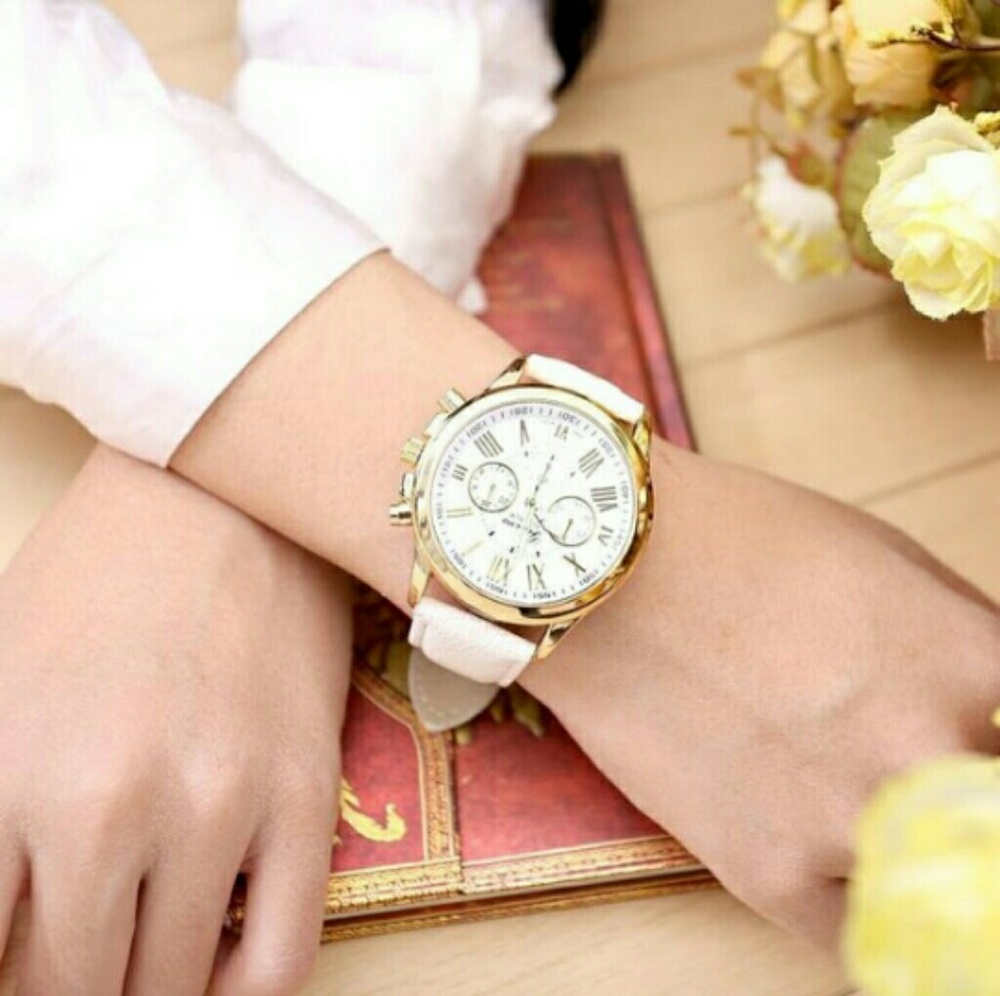 Stunning White Watch with Gold Accents