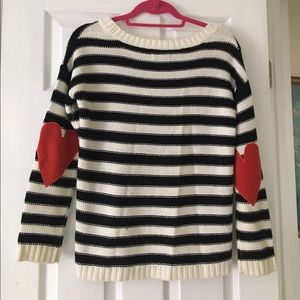 Sweater with heart elbow patches