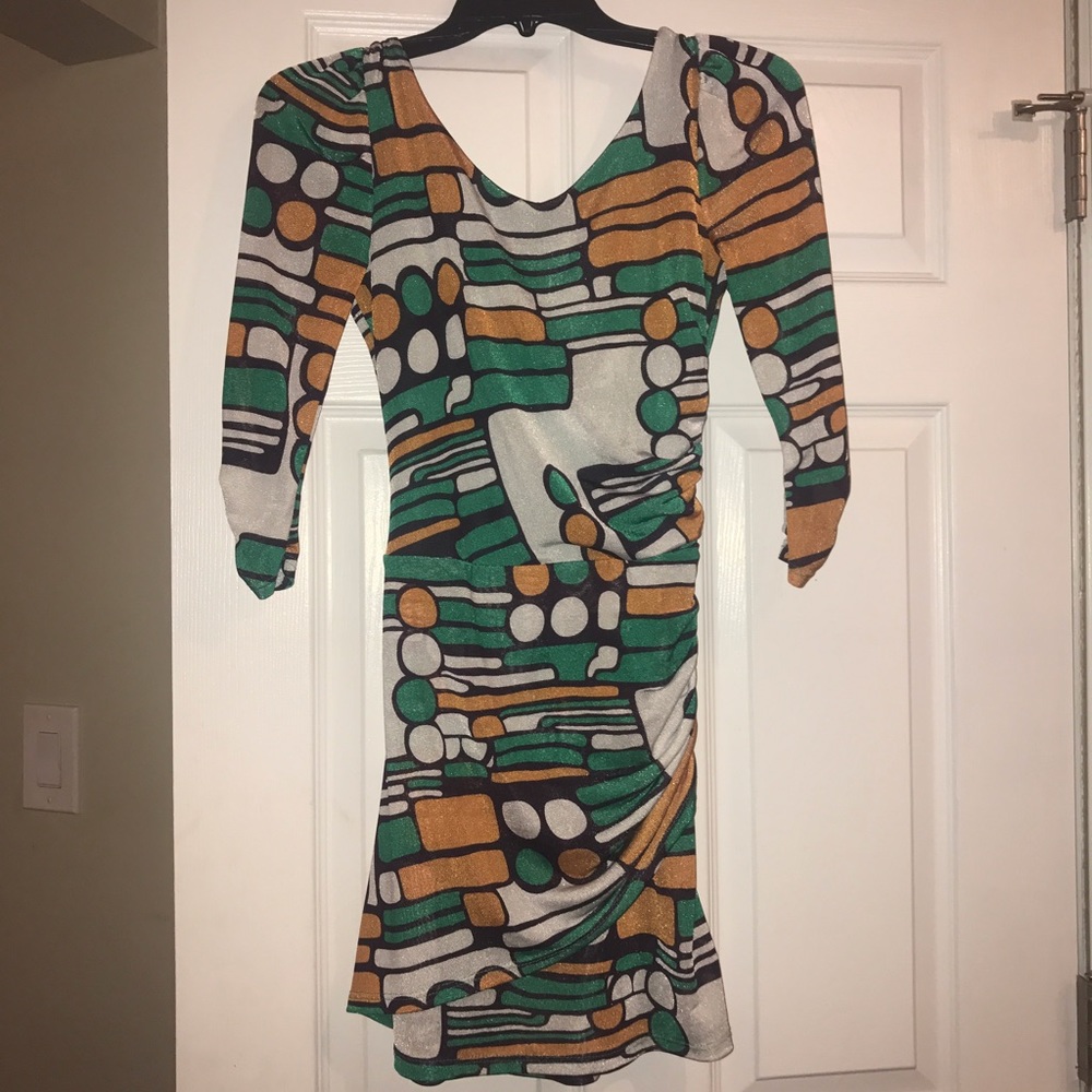 multi colored asymmetric dress with keyhole back.