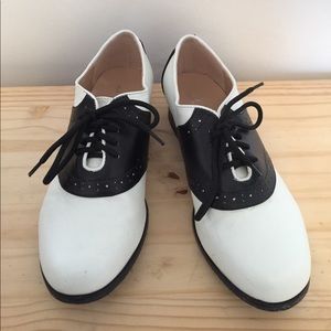 Black and white saddle shoes, good condition!