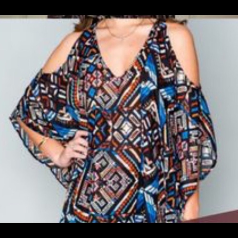 Show me your MuMu open shoulder tunic