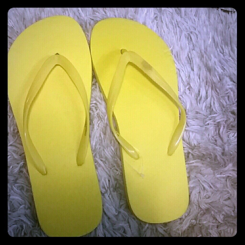 Bright yellow flip-flops