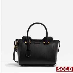 NWOT. Charles&Keith trapeze handbag