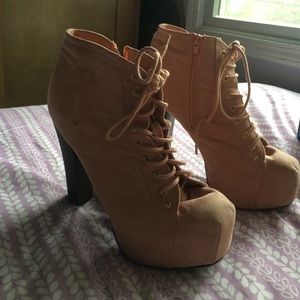 Pink high heeled booties