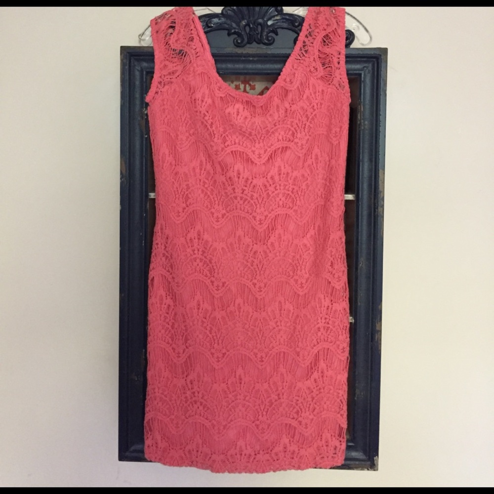 Flirty and fun eyelash lace coral dress