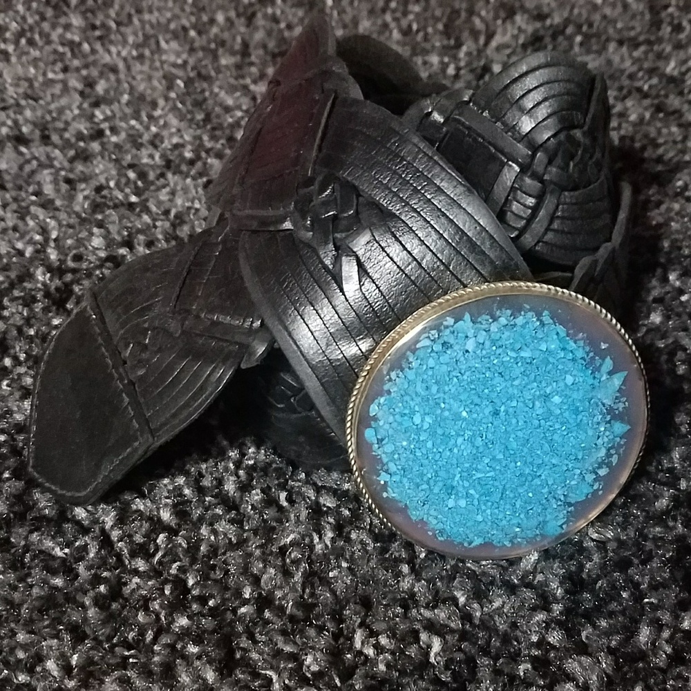 Woven belt with turquoise belt buckle